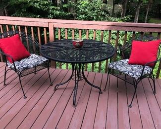 Wrought iron table and four chairs