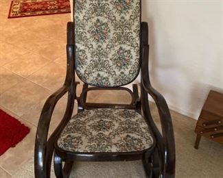 Wooden Rocking chair with a little doggie damage