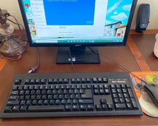 Super Writemaster PC that has been restored to factory settings that comes with monitor, keyboard, mouse, and speakers.