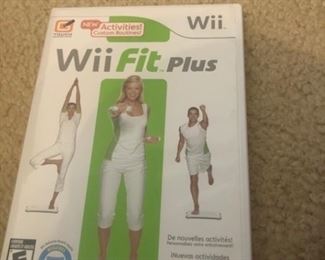 Wii with Wii fit board and other games