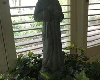 St. Frances statue surrounded by an ivy tray.