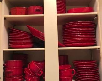 A large set of Italian pottery in a Christmas red.