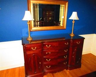 Sideboard $650, Pair of Candlestick Lamps $45, Decorative Mirror $115