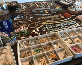 Huge table filled with high end Vintage Jewelry