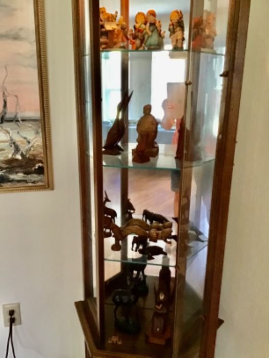 Curio with wood Figurines  and Hummels 