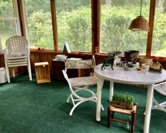 Porch with furniture, pots, door stops etc