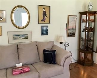 Living room, Asian Art, lighted display cabinet, figurines, Hummels.