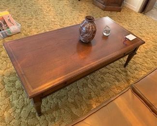  Vintage Brandt   Pecan  coffee table Measures  46“ x 22“ across the top And 15 1/2 inchesheight