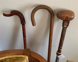 Collection of hand carved walking sticks