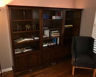 Display/bookcases with bottom storage.  Shown with 3 pieces, each can stand alone.  These match the other set of 3 pictured earlier.