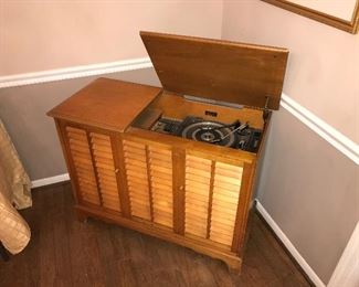 Record player in cabinet