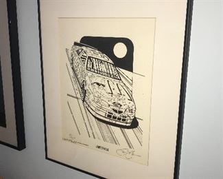 Framed black and white nascar artwork, signed by Sam Bass. Numbered 92/250.  Sam Bass is an American Motorsports artist known for being NASCAR's first officially licensed artist.