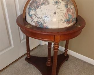 Standing globe with University of Chicago emblem.