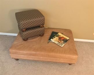 Leather ottoman and a pair of green silk footstools.