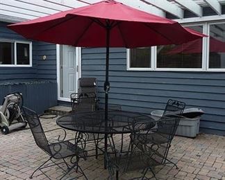 Wrought Iron Table and Chairs and Umbrella
