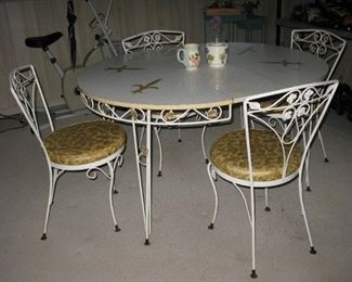 white metal table, leaf and 4 chairs                                        
            BUY IT NOW $ 85.00
