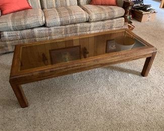 #63 Wooden coffee table with glass top $60