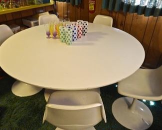 Table and 5 chairs. Highball glasses with dots not available 