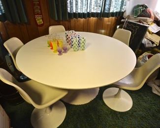 Table and 5 chairs.  Highball glasses with dots not available 