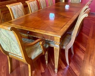 Lot 1501 Asking $4,250.00 Ethan Allen Townhouse Dining Table Shown with 2 Leaves and 10 Adison Chairs (by the way, that is the correct spelling of the chairs, too). Look at that gorgeous wood! This is a future antique that will be used by your grandkids grandchildren and then some. Also table has two pullout drawers, one on either side. Cool.