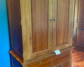 Lot 1517 $900.00. Beautiful "Marquette" Wardrobe by Virginia Sterling from Tom's Price, with lots drawers to keep organized and 2 Drawers on the Bottom of Cabinet. Orig. Pd $2917.00. 43.25" W x 24" D by 78" H.