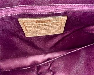 Lot 1521 $65.00. Authentic Coach Pebble Leather with Snake Skin treatment in the center of the bag. 2 Handles, plus removable shoulder strap. Excellent Condition, Official Coach Fob and Leather Tag. Front Flap with interesting metal closure, and handy Inside Zipper Compartments. Perfect for Fall!