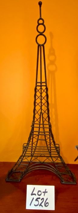 Lot 1526 $ 40.00 Metal Eiffel Tower Art and Clock with Pendulum and White Face. Battery Operated. Tower: 26.5" T x 12" W Clock: 28.5" T x 11" W