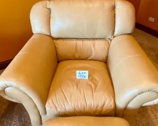 Lot 1536. $375.00 Matching Tan Leather Oversized Chair & Ottoman with Rolled Arms and Attached Comfy Cushions in Great Shape and Color 46" W x 40" H x 38" D, Cushion 24" D x 17" H x 21" W