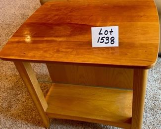 Lot 1538 $75.00 Maple Side Table w/ 1 Door in Front and Back, Glass Shelf, Maple and Cherry Veneers, The Top Surface shows wear and rough spots. Made by Riverside Furniture 26" D x 22" W x 24" H
