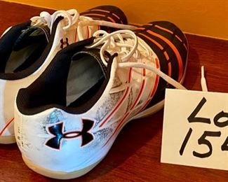 Lot 1545. $18.00 Pair of Under Armor "Man Mapper" Athletic Shoes with Orange Stripes, Scuff marks Visible. USA Size 7