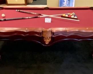 Lot 1560 Asking $995.00 Peter Vitalie Co. "Gore Gulch Select" Premier Pool Table, 96" L x 56", with American Heritage Pool Cues, A Set of Billiard Balls, a Training Ball by American Heritage, 1 Brush, 15 Ball and 8 ball Rack. I would have to say, this is one of the nicest looking Pool Tables I have had the privilege to offer for sale. We do have vendors that specialize in Pool Table moving. Since a pool table needs to be balanced and re-felted after a move, moving this by a professional is a must. .