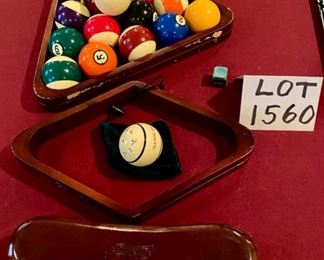 Lot 1560 Asking $995.00 Peter Vitalie Co. "Gore Gulch Select" Premier Pool Table, 96" L x 56", with American Heritage Pool Cues, A Set of Billiard Balls, a Training Ball by American Heritage, 1 Brush, 15 Ball and 8 ball Rack. I would have to say, this is one of the nicest looking Pool Tables I have had the privilege to offer for sale. We do have vendors that specialize in Pool Table moving. Since a pool table needs to be balanced and re-felted after a move, moving this by a professional is a must. .