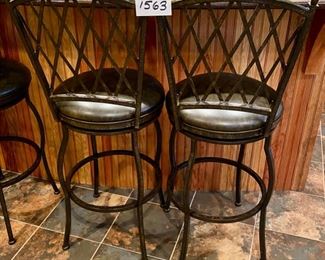 Lot 1563. $180.00. Set of two Premier 30" Atrium Rounded Swivel Bar Stools made of Wrought Iron with Full Back Support, Interwoven Lattice Pattern Back in Autumn Rust Finish and Coffee Colored Vinyl Upholstery. 30" H Seat, 18" Diameter Seat, 46" H on Back Rest
