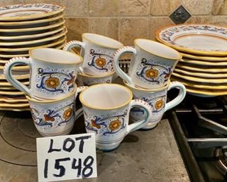 Lot 1548 $250.00 (Retails for $560.00) Sur La Table Nova DeRuta Pottery Dinnerware service for almost 8 - includes 7 dinner plates and 8 mugs (one not shown),, 8 salad and 8 soup plates. Serving pieces sold separately, Microwave safe hand-crafted in Italy. Retails for $560 Asking $250. Classic good looks.