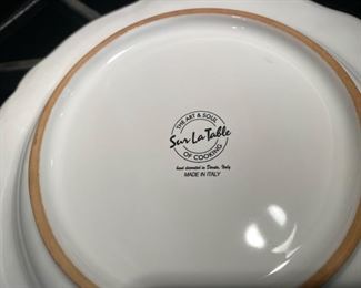 Lot 1548 $250.00 (Retails for $560.00) Sur La Table Nova DeRuta Pottery Dinnerware service for almost 8 - includes 7 dinner plates and 8 mugs (one not shown),, 8 salad and 8 soup plates. Serving pieces sold separately, Microwave safe hand-crafted in Italy. Retails for $560 Asking $250. Classic good looks.