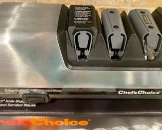 Lot 1558. $95. Chef's Choice Professional 120 Knife Sharpener, Heavy Duty Model. New in Box. Ebay sold prices range around $200. BY THE WAY, there is an interesting video on You Tube about how to sharpen knives correctly using this machine.