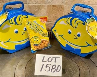 Lot 1580. $15.00. Two "Lemonhead" Metal Lunch Boxes, plus one unopened bag of Lemonhead Candy (for decor - candy expired in 2012!) Never used, Cute!