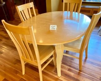Lot 1566 $375.00 Bassett Round Table w/ 4 Cabriole Legs Kitchen Table and Matching Chairs plus One 12" Leaf (shown in either Maple or Birch. The next lot is a match for this table. Very Attractive piece. Table: 48" Diameter + 12" Leaf, Chairs: 40" H x 18" D x 19" W Seat and 17.5" H Orig. Pd over $1400.00,