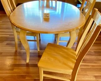Lot 1566 $375.00 Bassett Round Table w/ 4 Cabriole Legs Kitchen Table and Matching Chairs plus One 12" Leaf (shown in either Maple or Birch. The next lot is a match for this table. Very Attractive piece. Table: 48" Diameter + 12" Leaf, Chairs: 40" H x 18" D x 19" W Seat and 17.5" H Orig. Pd over $1400.00,