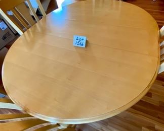 Lot 1566 $375.00 Bassett Round Table w/ 4 Cabriole Legs Kitchen Table and Matching Chairs plus One 12" Leaf (shown in either Maple or Birch. The next lot is a match for this table. Very Attractive piece. Table: 48" Diameter + 12" Leaf, Chairs: 40" H x 18" D x 19" W Seat and 17.5" H Orig. Pd over $1400.00,