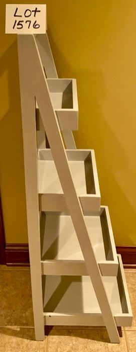 Lot 1576 $75.00. "Step Ladder" Plant Stand, painted gray with 4 shelves. 48" high x 15" D x 16" wide