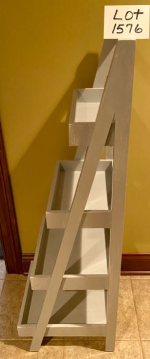 Lot 1576 $75.00. "Step Ladder" Plant Stand, painted gray with 4 shelves. 48" high x 15" D x 16" wide