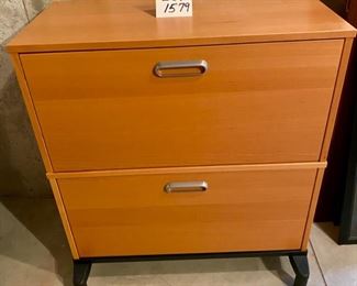 Lot 1579 $50.00 2 Drawer Lateral File Cabinet, with Metal Pulls on a Black Metal Base. 33-1/4" W x 17" D x 37-1/2" T. Matches Lot 1620 and 1621.