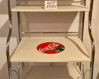 Lot 1595 $175.00. Attention Coca Cola Collectors! Coca-Cola Collector's Stand, Chrome Metal Frame, Coated Composite Shelves." 65" T x 25" W x 19"D. 5 shelves, 2 shelves are 12"D