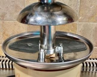 Lot 1604. The best $30 you will ever spend! Yum! Kids and Grandkids love this! Chocolate Fondue Fountain by Nostalgia Electrics