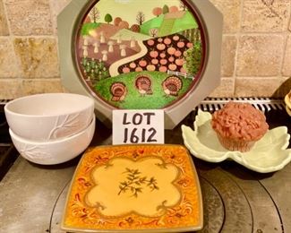 Lot 1612 $24.00 Metal Turkey Farm Scene Tray, , Leaf-Shaped pale green ceramic dish, cupcake candle, Squarish Colorful Serving Plaate, perfect for Thanksgiving, and Two White Holiday Bowls with decor.
