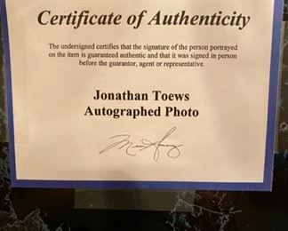 Lot 1626. $80 Blackhawk's Fave and I think Captain Jonathan Toews Hand-Signed 8x10 Photo with NHLHOLO x COA, Plus, if that wasn't enough, 2 Brand New Toews Bobbleheads!