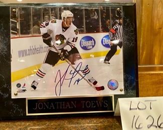 Lot 1626. $80 Blackhawk's Fave and I think Captain Jonathan Toews Hand-Signed 8x10 Photo with NHLHOLO x COA, Plus, if that wasn't enough, 2 Brand New Toews Bobbleheads!