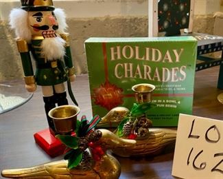 Lot 1623. $27.00. Christmas Lot. Nutcracker 8: Tall, Holiday Charades, Unopened, Brass Christmas Duck Candle Holders - pair, Gorham silver-Plated Ornament frames 3/pkg New in package. What a deal