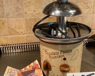 Lot 1604. The best $30 you will ever spend! Yum! Kids and Grandkids love this! Chocolate Fondue Fountain by Nostalgia Electrics